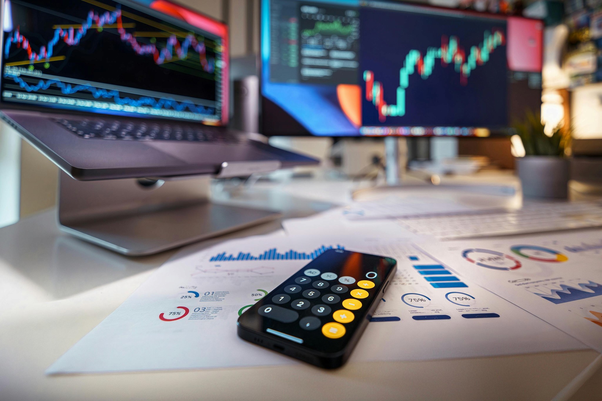 A workspace showing a calculator and marketing data, emphasizing cost-effective marketing as an advantage of live streaming