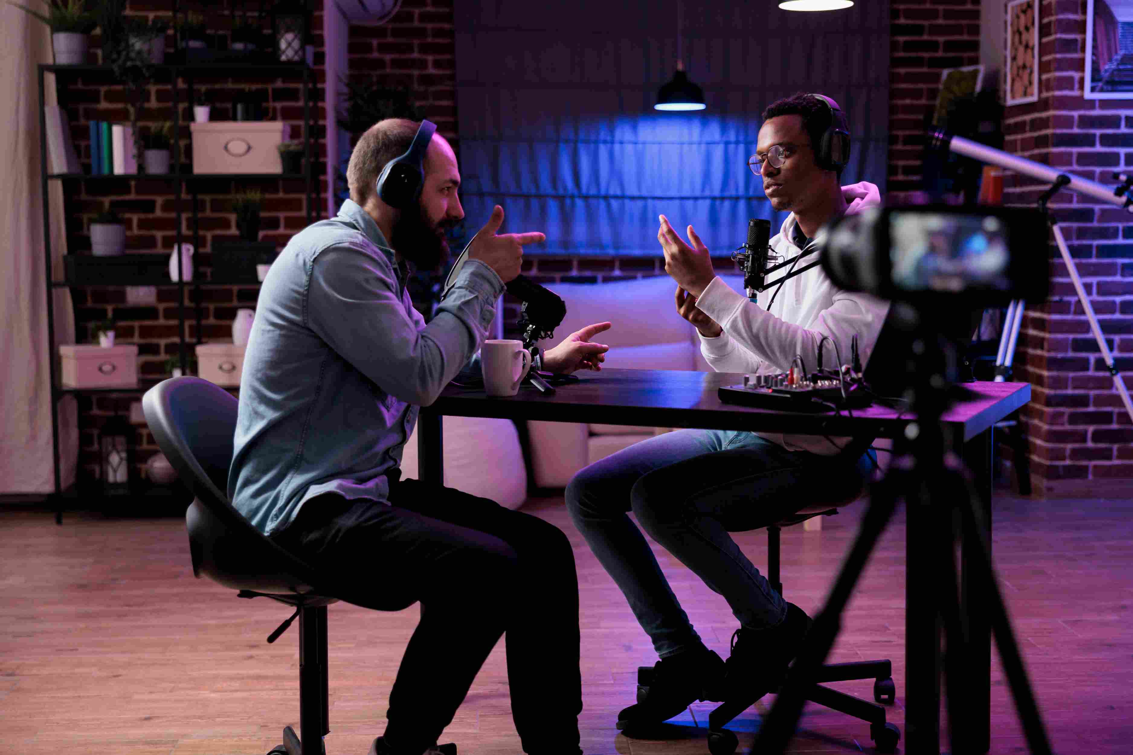 two young men recording a podcast episode